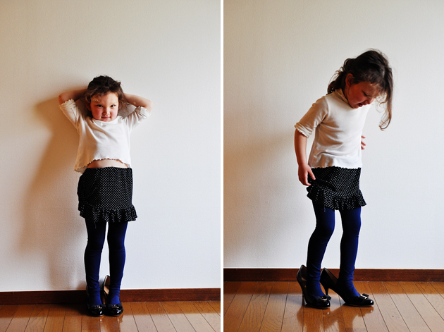 Little girl wearing salvatore ferragamo pumps