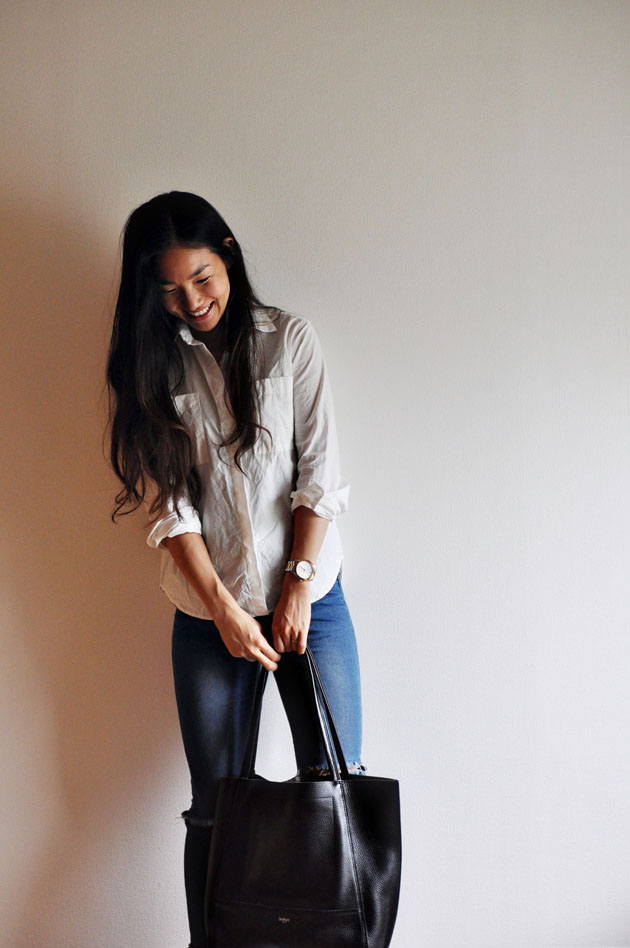 white-button-up-blue-jeans-black-leather-tote